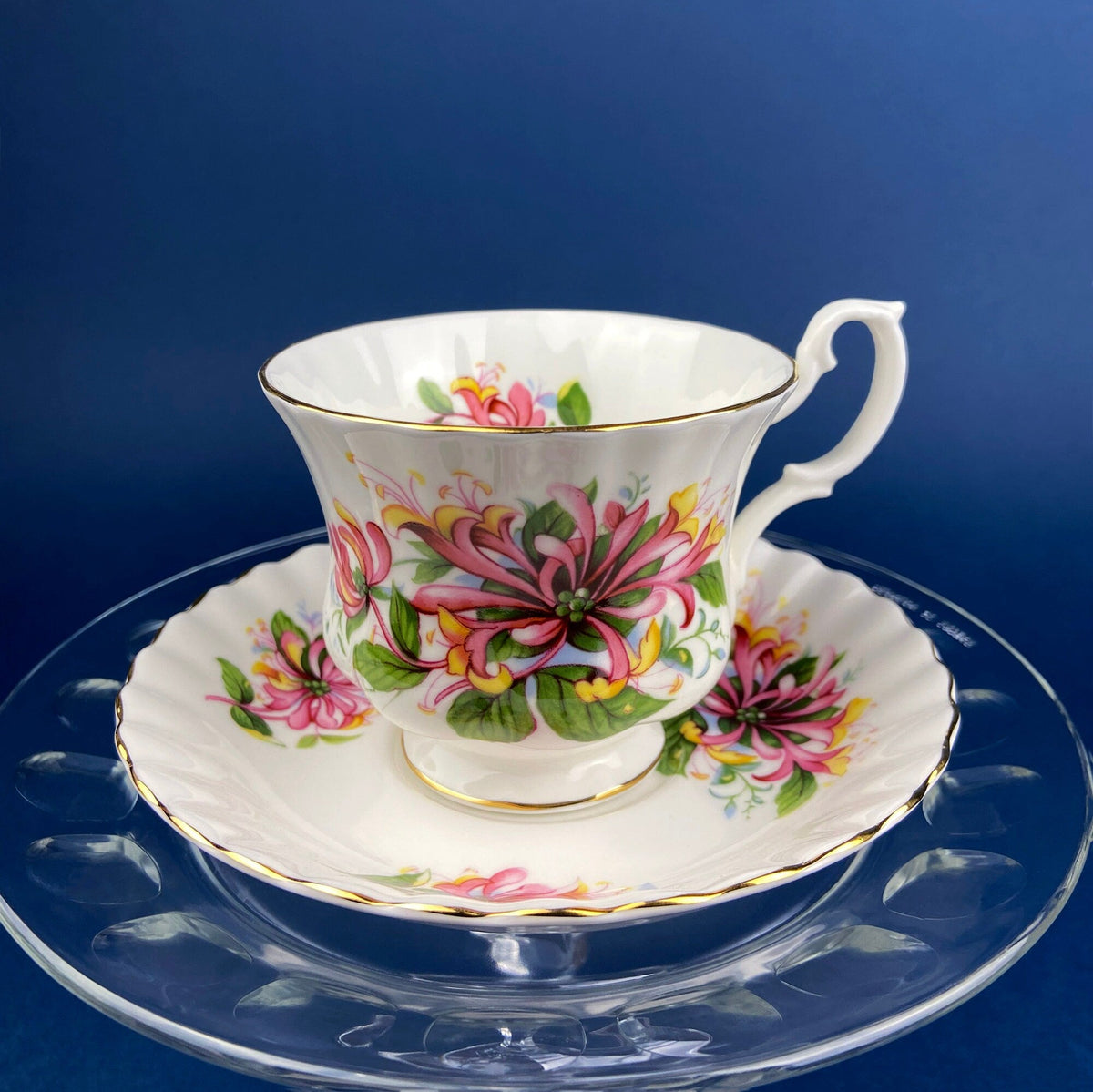 Vintage Tuscan Cup and Saucer: Hand-Painted Floral Tea Set