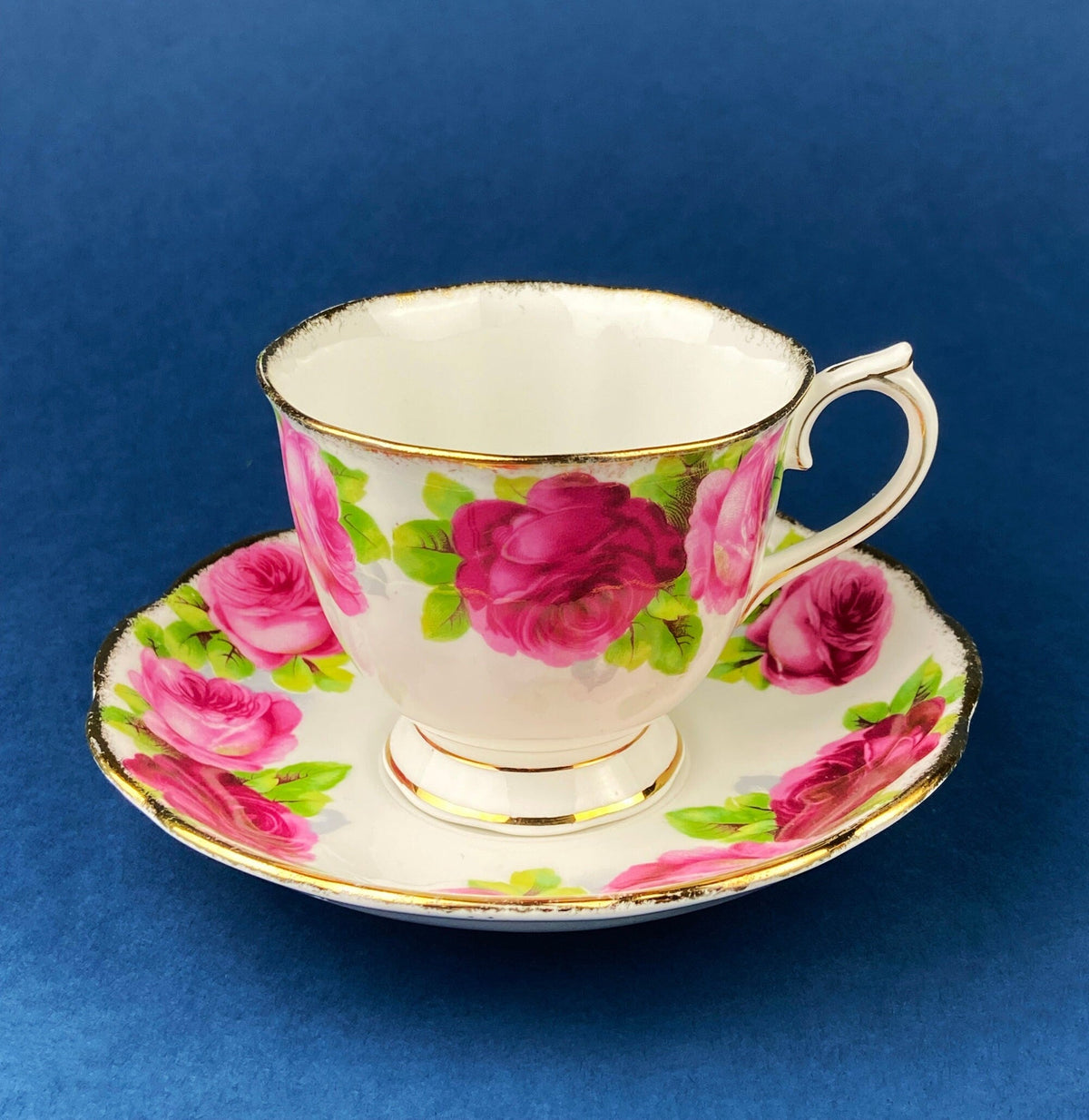 Antique Cup and Saucer By Royal Albert. Old English Rose Motif. Made in England. Fine Bone China. Collectibles. Replacements.