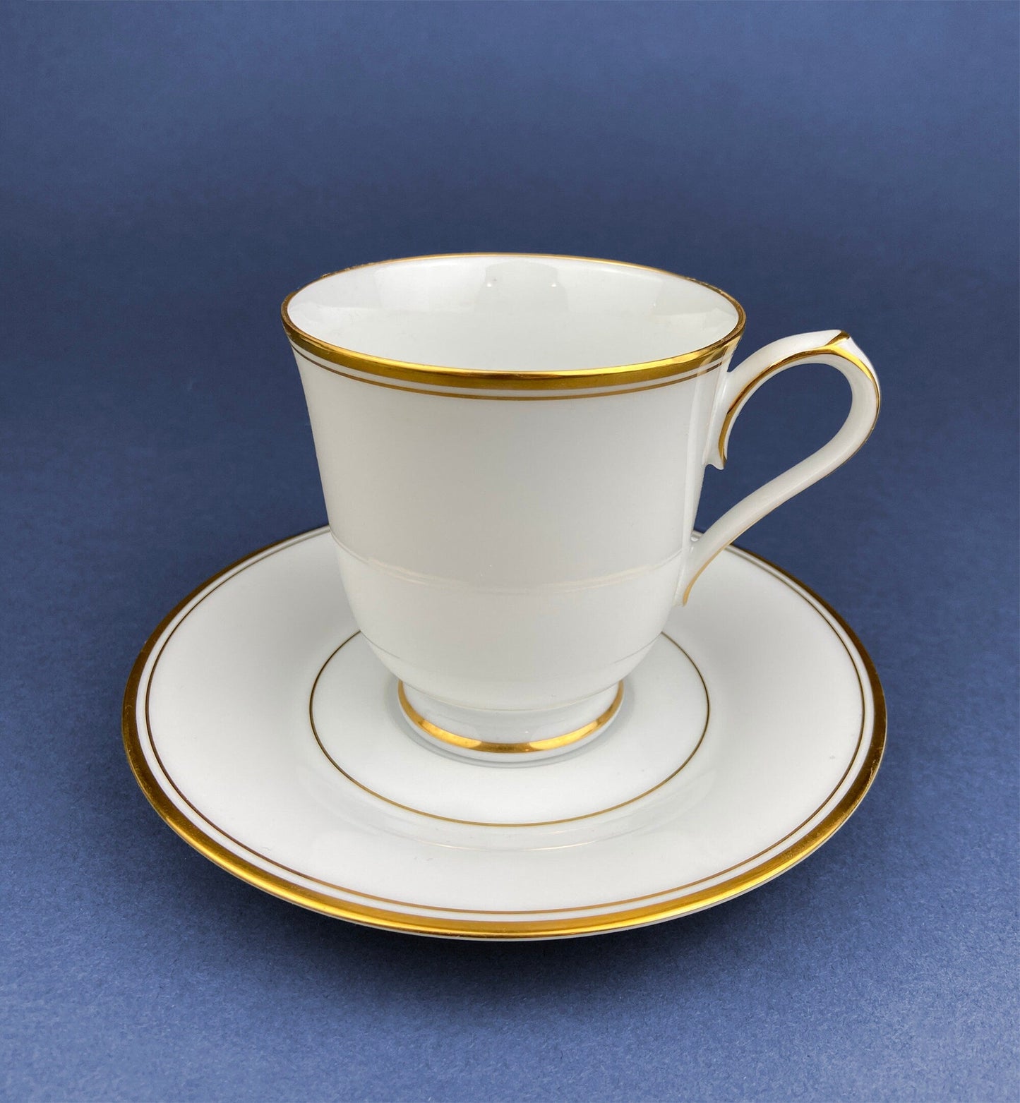 White China Cups and Saucers: Gold Embossed Band, Set of 5
