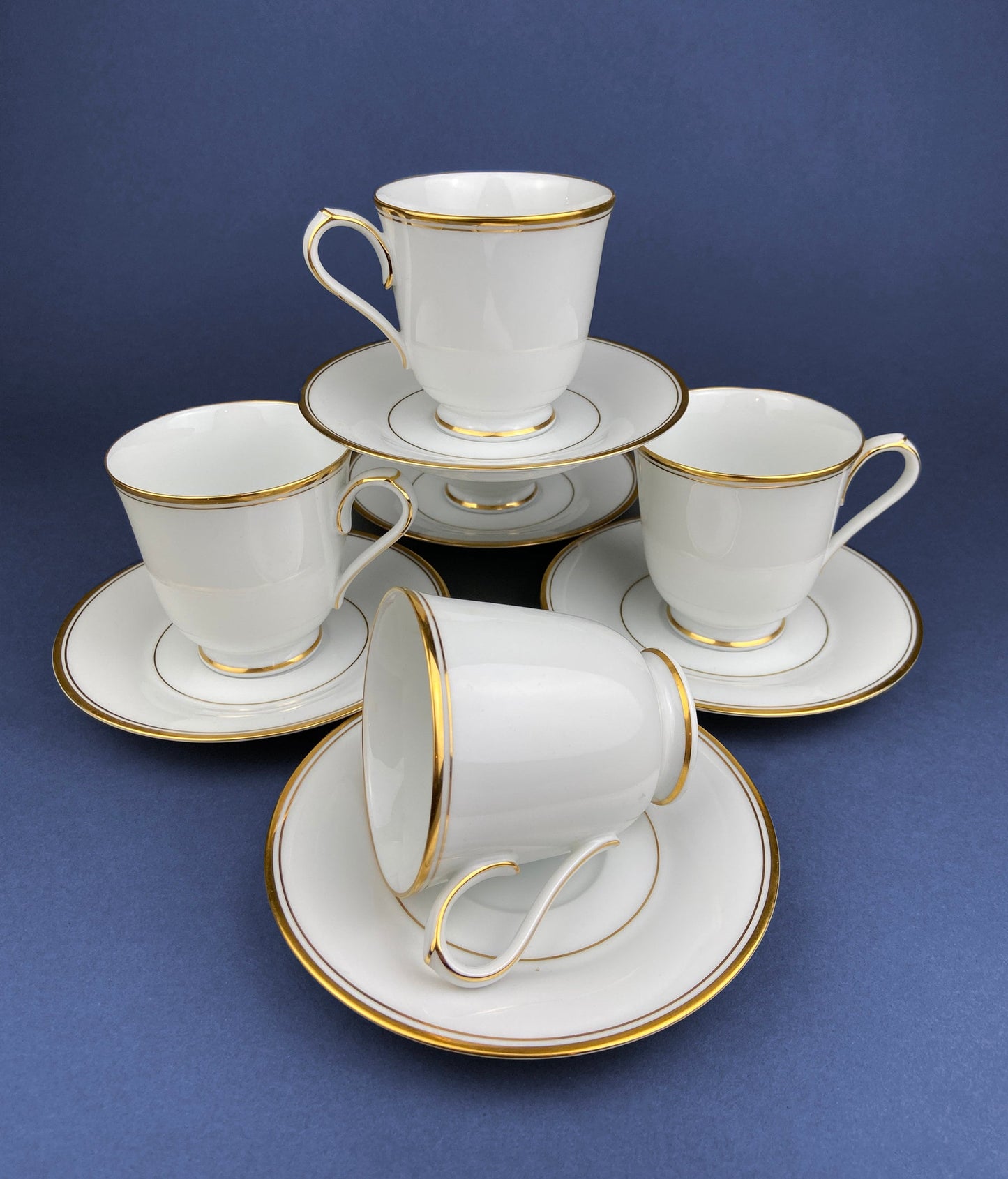 White China Cups and Saucers: Gold Embossed Band, Set of 5