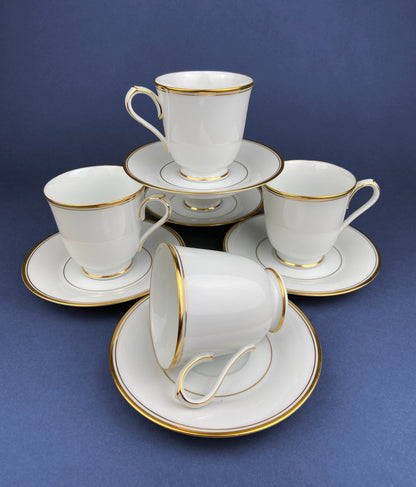 White China Cups and Saucers: Gold Embossed Band, Set of 5