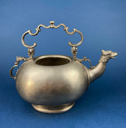 Pewter Teapot by Etain Zinn.  Etched with Heart and Cupids Antique Teapot. Spout Shaped like Eagle. Back Handle with Lion.