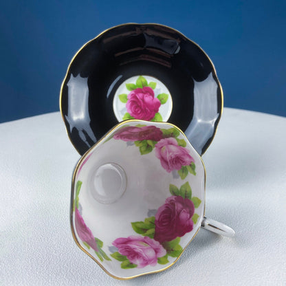 Black Cup and Saucer with Roses on White Background Inside the Cup. Royal Albert Old Country Rose Tea Set. Hand Painted Pink & Red Roses.
