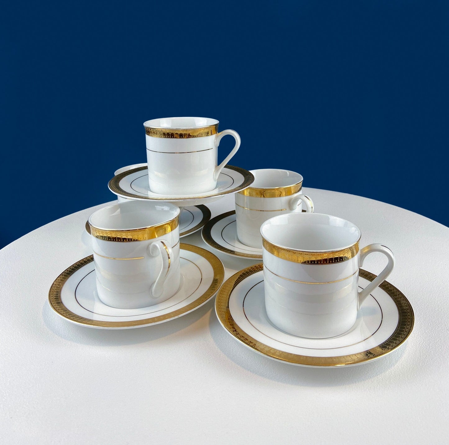 White China Cups and Saucers: Gold Embossed Band, Set of 5