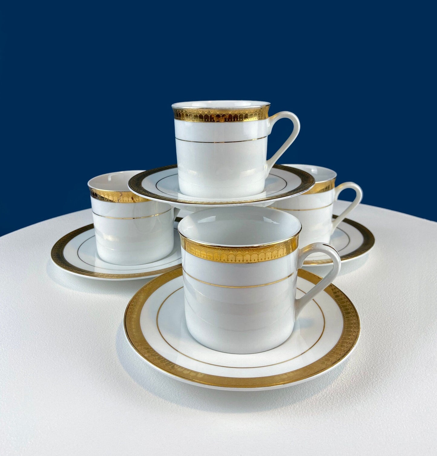 White China Cups and Saucers: Gold Embossed Band, Set of 5